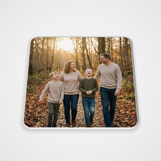 Neoprene coaster, 4.25 in with a family photo printed on it