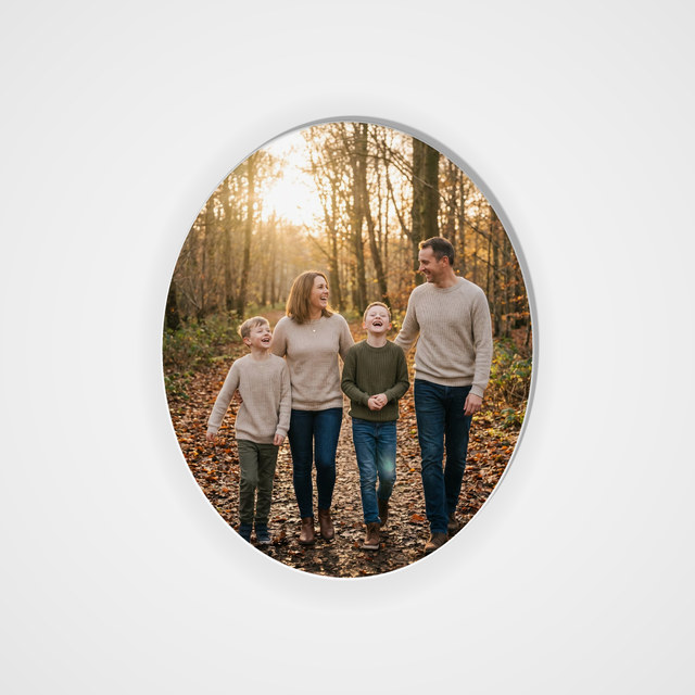 Metal ornament, oval with a family photo printed on it
